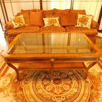 Sofa with glass topped coffee table 