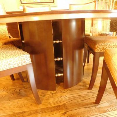 Circular dining table wit (6) chairs and buffet