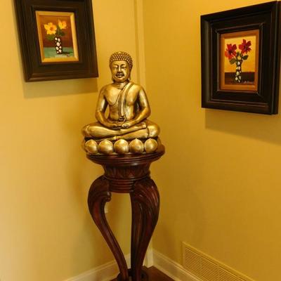 Buda on pedestal stand