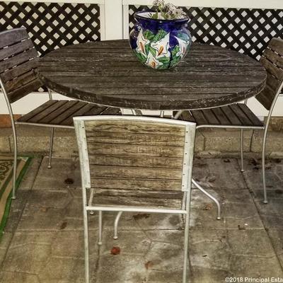 Rustic wrought iron wood slat table with 3 chairs