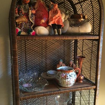 Rattan Shelf with Assorted KnickKnacks.
