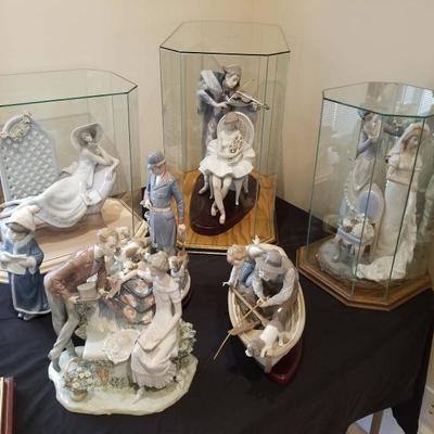Several very large LLadro in lucite cases