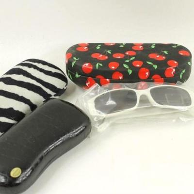 3 Glasses Cases and a Pair of Sunglasses with Cherries on the Bows