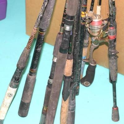 Lot of Fishing Poles and 1 Reel