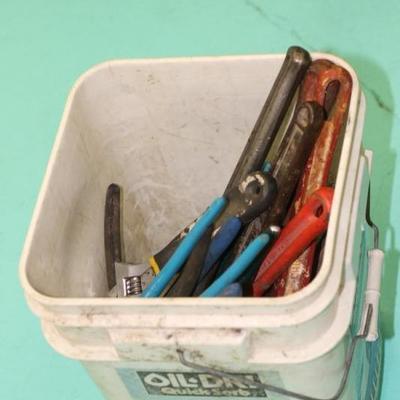 Bucket of Pipe Wrenches and Wrenches