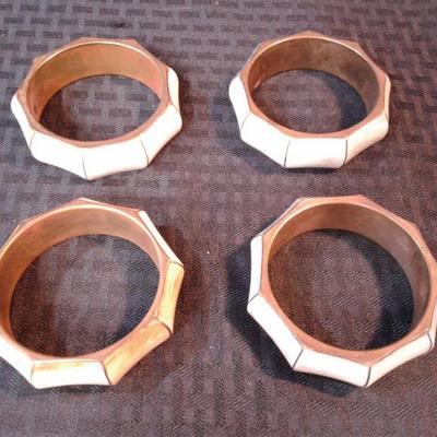 Four Brass and Horn bracelets