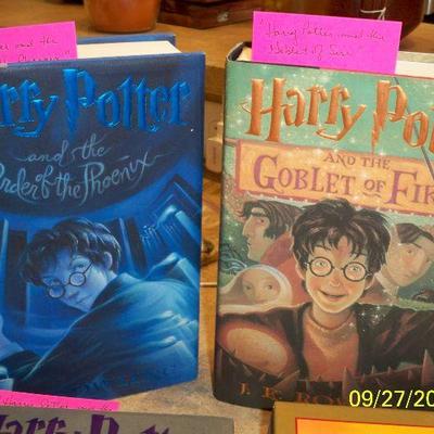Harry Potter Books with dust covers, spins unbroken.