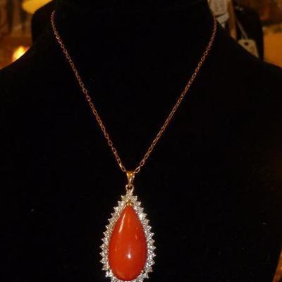 Red coral and diamond pendant