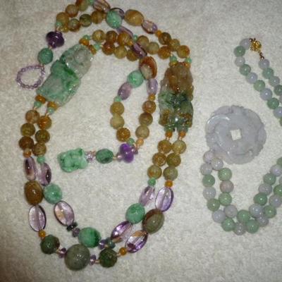 Nice selection of estate jadeite vintage necklaces.