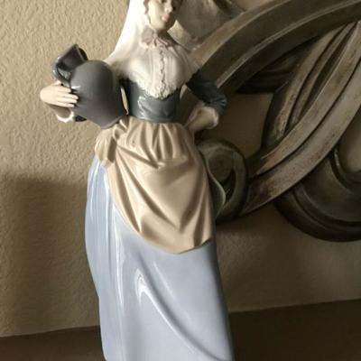 Nao by Lladro. 1985. Woman with water jug. Rare. Purchased in Spain. $100.
