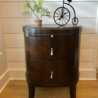 Custom made dark wood oval side table. Gorgeous. Two available. Originally purchased for $1,000 each. Estate sale price: $175 each. ........