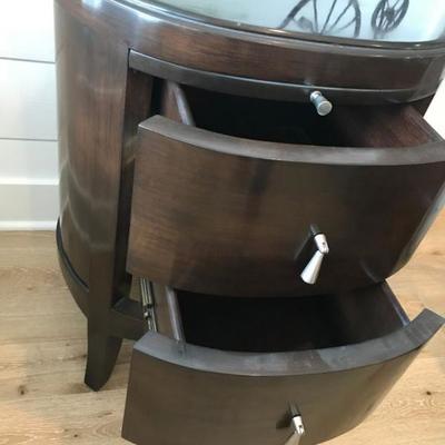 Custom made dark wood oval side table. Gorgeous. Two available. Originally purchased for $1,000 each. Estate sale price: $175 each.