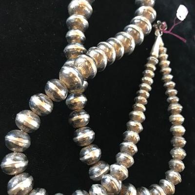 Navajo hammered silver graduated bead necklace. $115