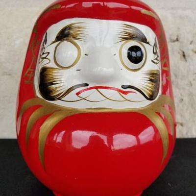 A Daruma doll (é”ç£¨ daruma) is a hollow, round, Japanese traditional doll modeled after Bodhidharma, the founder of the Zen tradition...
