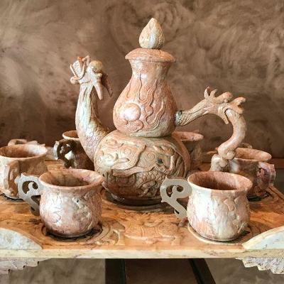 Marble dragon teapot set on tray. $85