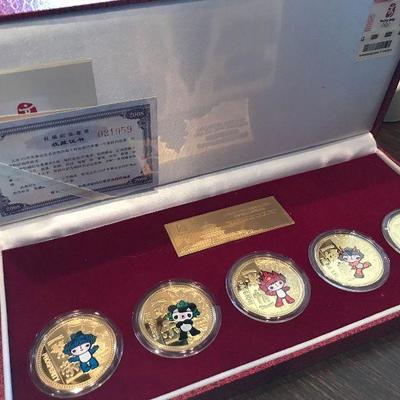 Olympic gold coins. Original box..