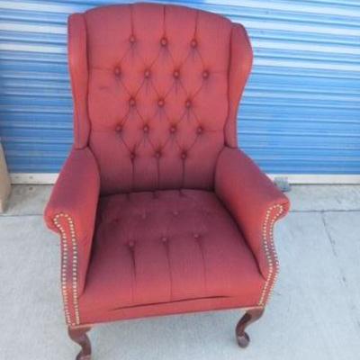 High back upholstered armed chairs