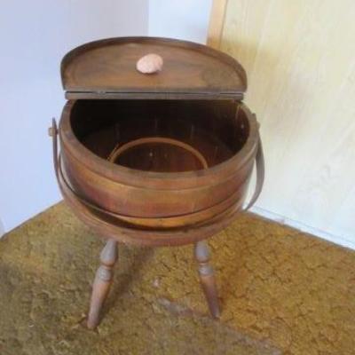 Antique sewing basket on legs
