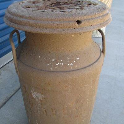 Outdoor Yard Décor - a vintage milk bucket