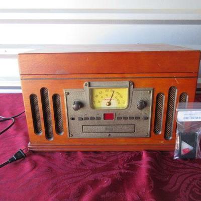 Vintage radio with record player on top