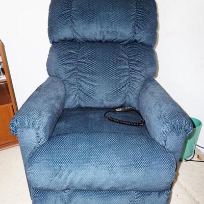 La Z Boy massage recliner.   Only used for  two weeks.  The fabric is like new, not shown in the photo.  There are no signs of fabric...