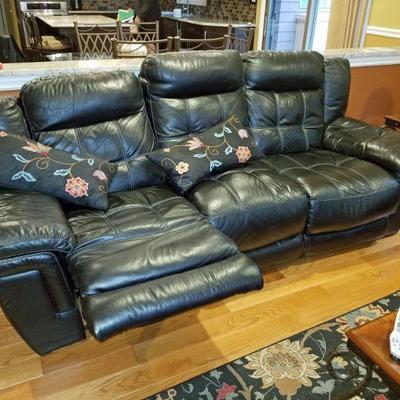 Leather sofa w/ recliners.