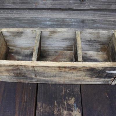 Farmhouse style wood boxes with bottles
