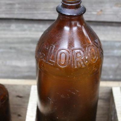 Wood box with vintage bottles