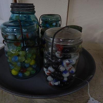 Ball jars of marbles