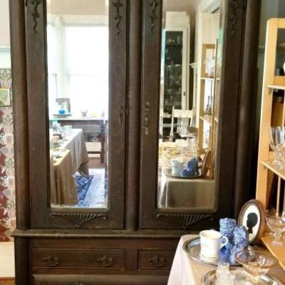 This massive antique armoire completely breaks down for easy moving.