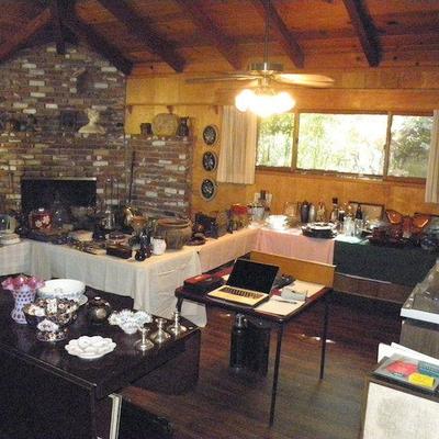 Family room with tables of  antique and collectible smalls