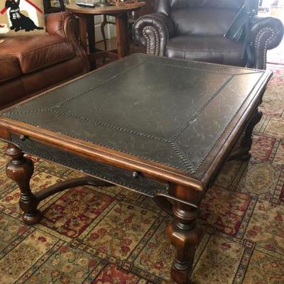Coffee table with tooled top