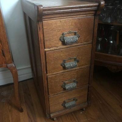 Unusually small antique office cabinet