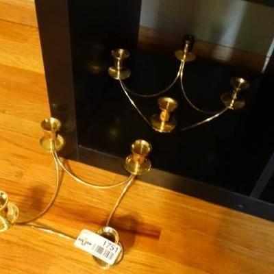 3 brass candle holders.