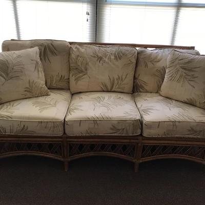Rattan sofa with accent chair and tables 
