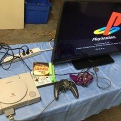 Playstation 1 with 2 controllers and 2 games -  t ...