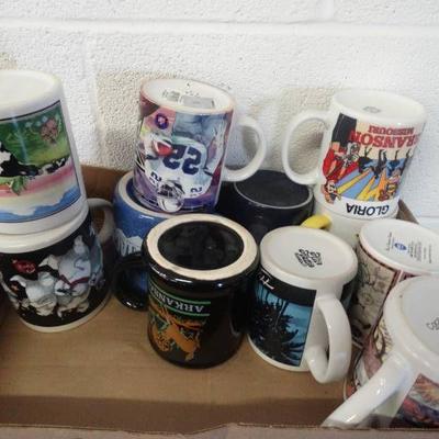 Lot of themed coffee mugs.