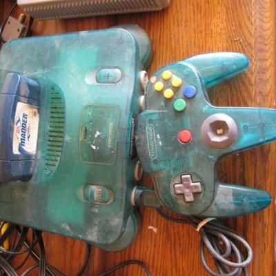 2 Nintendo 64 consoles, 2 controllers and 2 gam ...