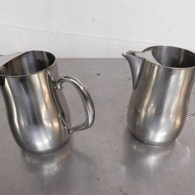 2 Walco Stainless Steel Water Pitchers.