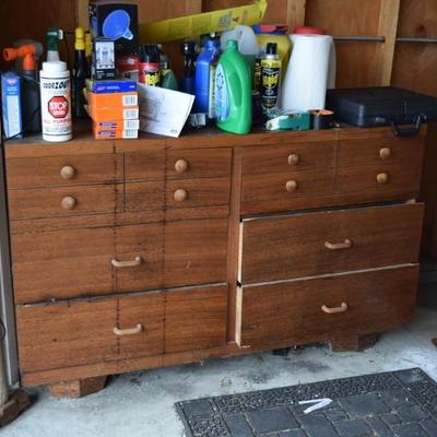 Dresser with Cleaning Supplies