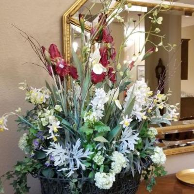 Wire basket with arrangement of artificial flowers. $40
