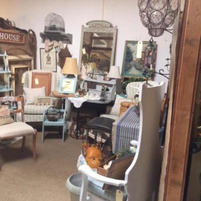 Wing back chairs with new custom slip covers ( which can be custom made for your chairs)   Ask for Karen or TC