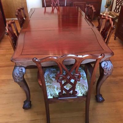 Imported from China in early 1980's Hand Carved Solid Rosewood Furniture With Gold Accent Hardware. Dining table, 1 extension leaf, 8...