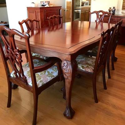 Imported from China in early 1980's Hand Carved Solid Rosewood Furniture With Gold Accent Hardware. Dining table, 1 extension leaf, 8...