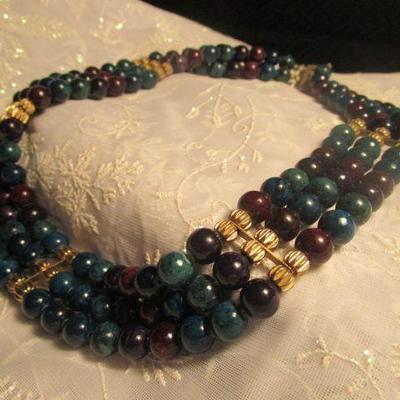 Heavy glass beads in green, purple, and navy blue choker necklace