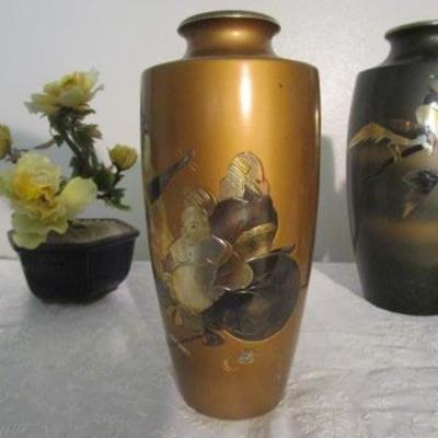 Oriental Vase with etched design in metal in black and gold