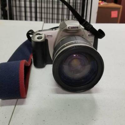Canon Camera with Lens and Neck Strap