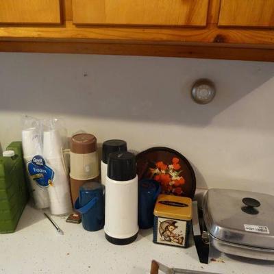 Lot of diahwasher detergent, foam cups, thermos co ...