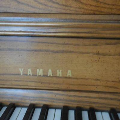Beautiful Yamaha M212 Piano, finely tuned.  Excellent condition.