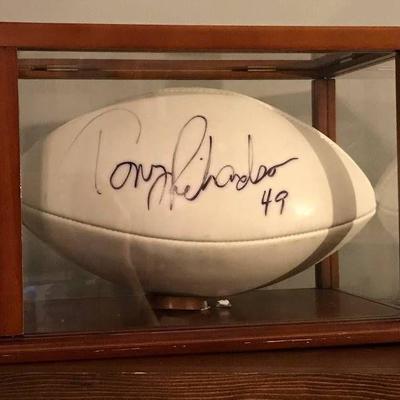 Autographed Wilson NFL Football in Case. Tony Ri ...